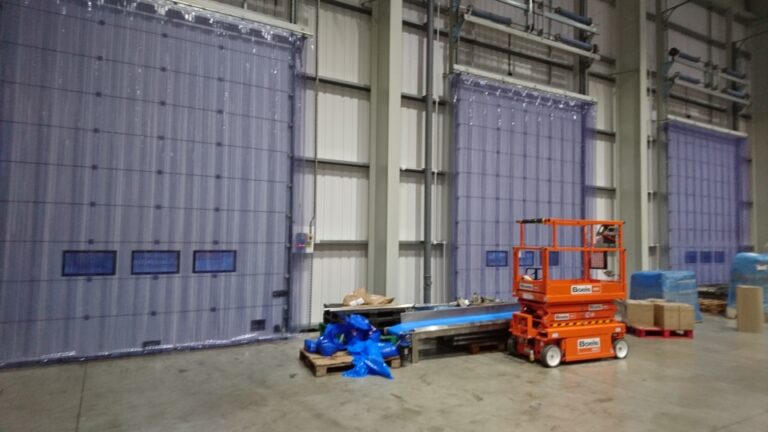 Levantine PVC Strip Curtain installation on the inside of a warehouse door with orange lift